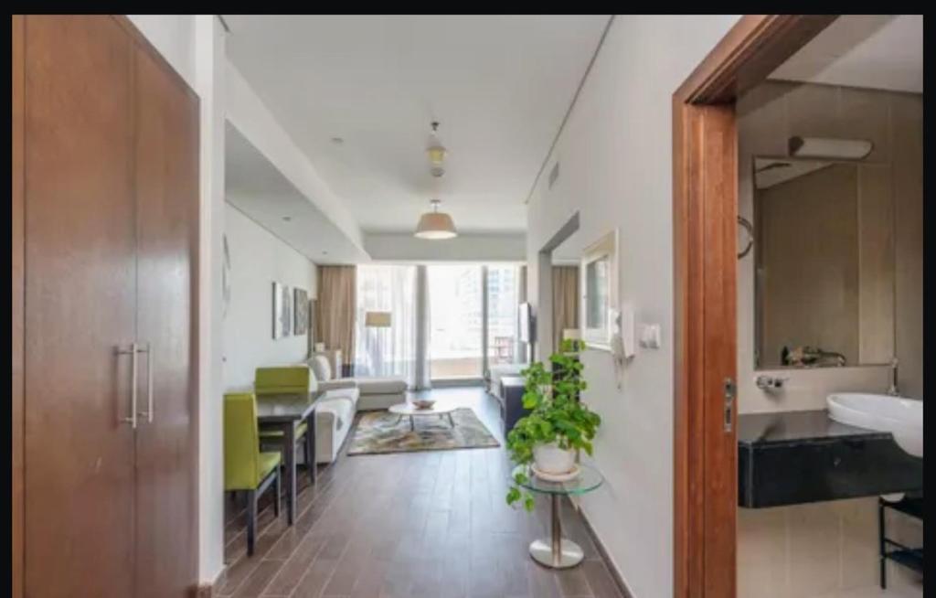 a large room with a kitchen and a dining room at Syed Guest House in Karachi