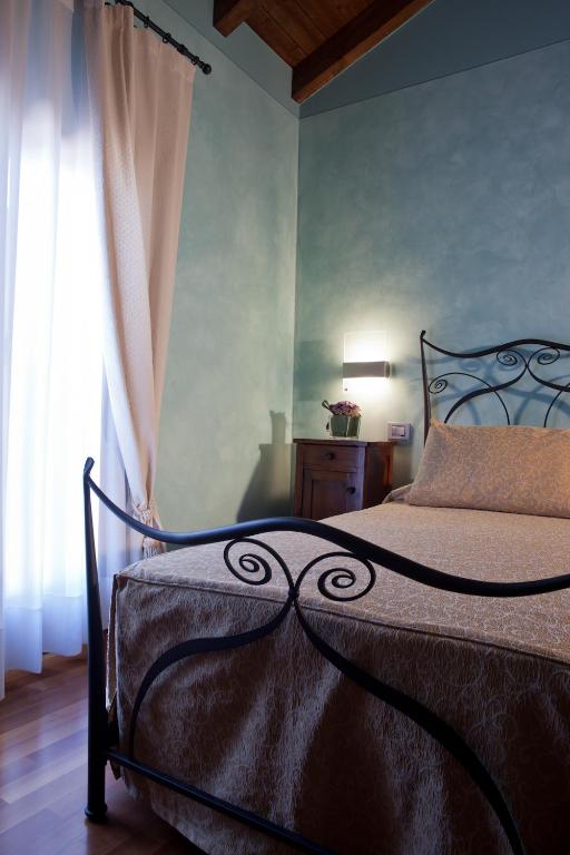 Postel nebo postele na pokoji v ubytování Relais Casa Orter