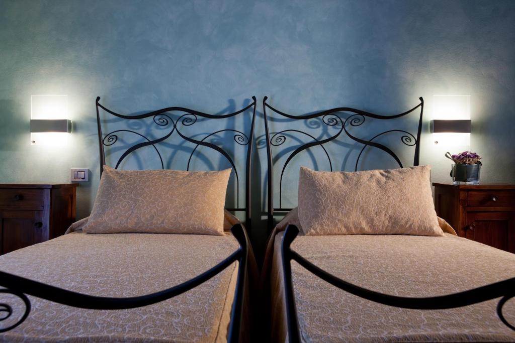 Postel nebo postele na pokoji v ubytování Relais Casa Orter