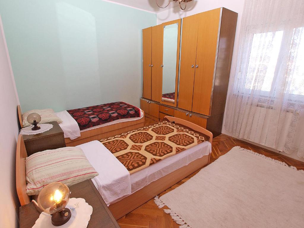 Posteľ alebo postele v izbe v ubytovaní Apartments Pula 926