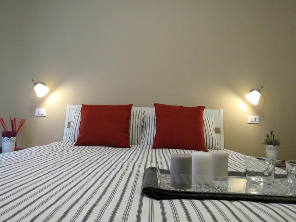 A bed or beds in a room at 8 Colonne Apartments