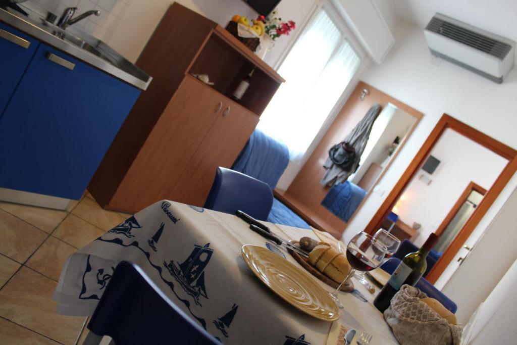 Kuchyň nebo kuchyňský kout v ubytování Residence Veliero