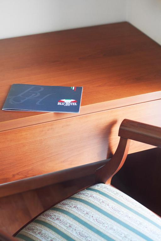Posteľ alebo postele v izbe v ubytovaní Blu Hotel