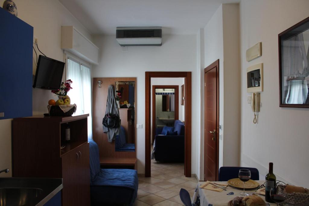TV a/nebo společenská místnost v ubytování Residence Veliero