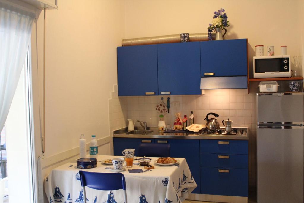 Kuchyň nebo kuchyňský kout v ubytování Residence Veliero