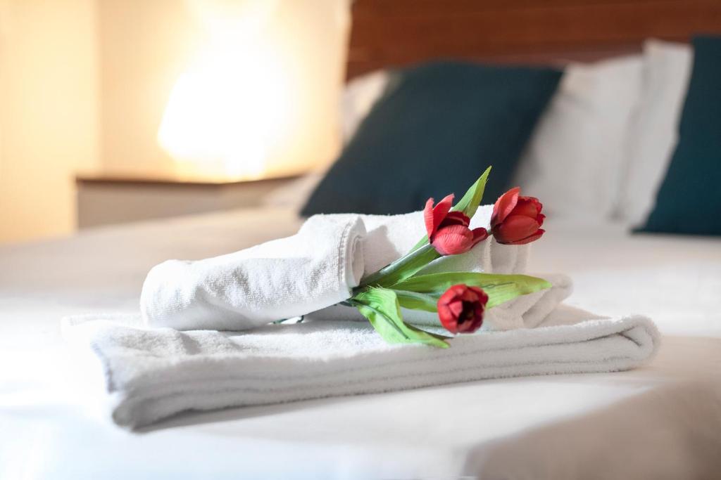 Posteľ alebo postele v izbe v ubytovaní Blu Hotel
