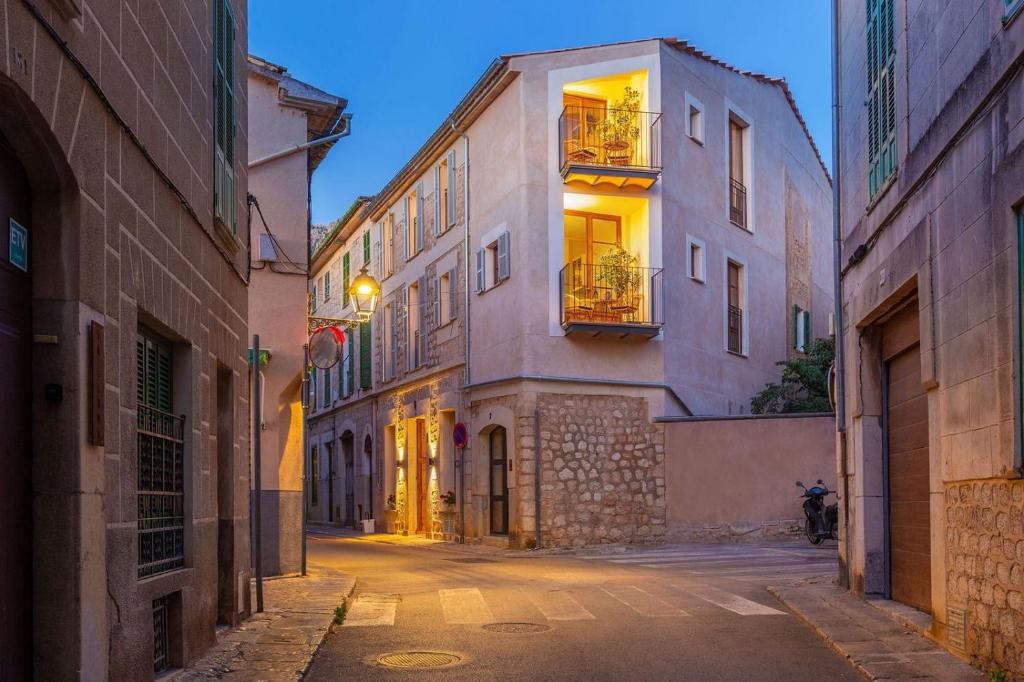 an alley in an old town at night at Can Perla in Sóller