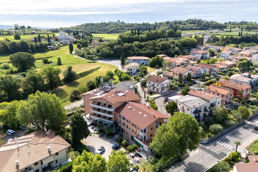 an aerial view of a small town with buildings at Hotel La Carica in Pastrengo