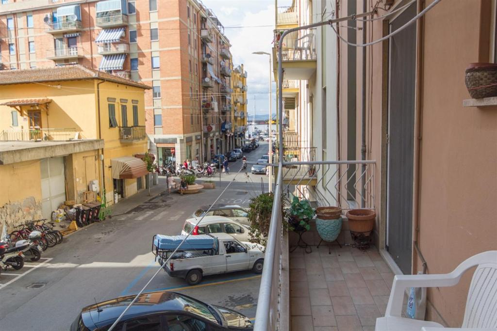a view from a balcony of a street with cars at Brezza dell'Argentario in Porto Santo Stefano