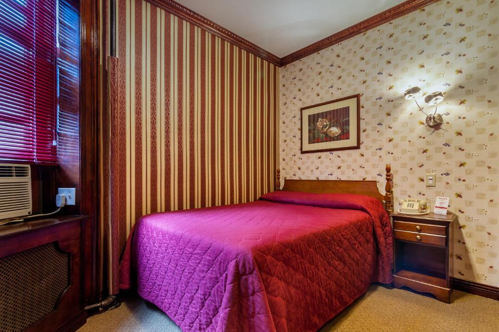 Postel nebo postele na pokoji v ubytování Hotel 31 Extended Stay