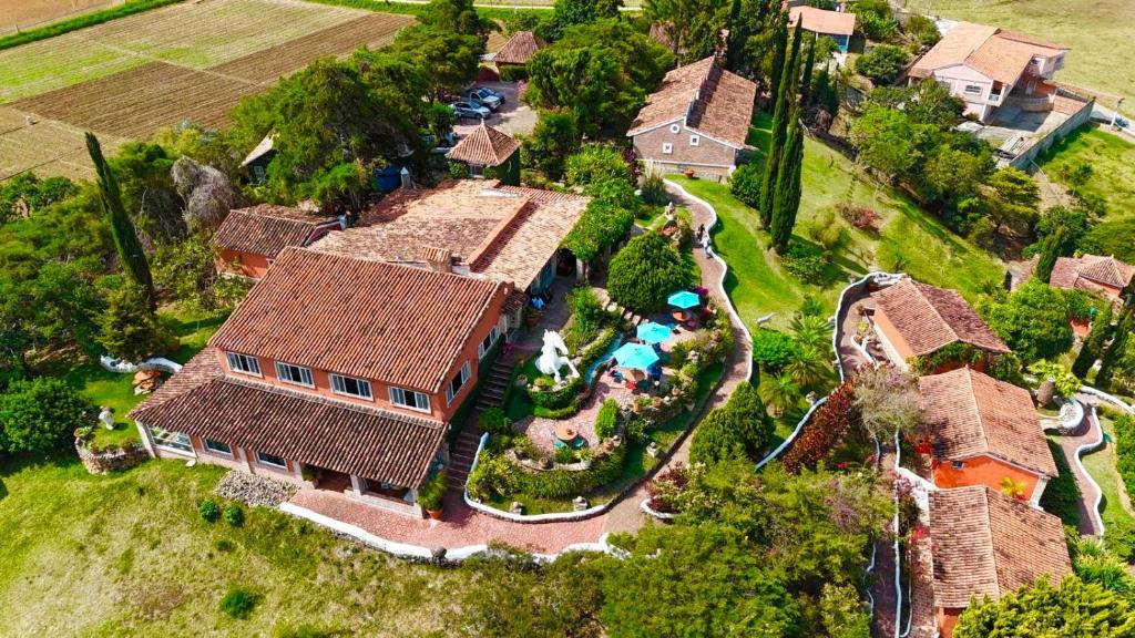 an aerial view of a large house with a yard at El Encanto Posada & Spa in Sabana Grande