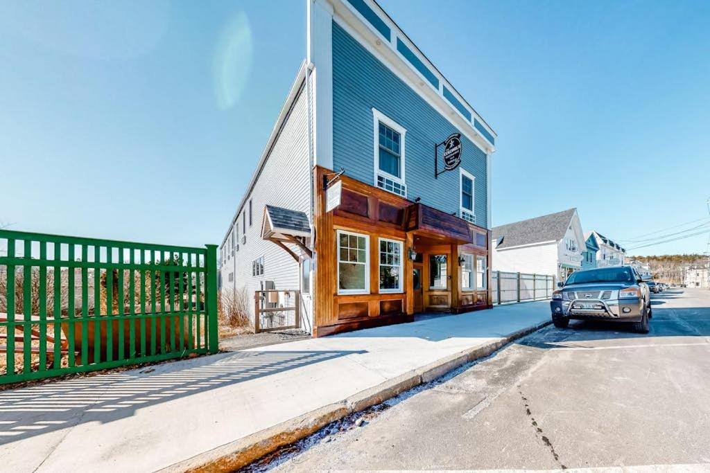 a car parked in front of a building at Comfortable Suite in Downtown Northeast Harbor w/ WiFi & AC - Walk to the Water in Northeast Harbor