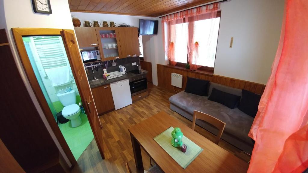Kuchyň nebo kuchyňský kout v ubytování Chata Alpina