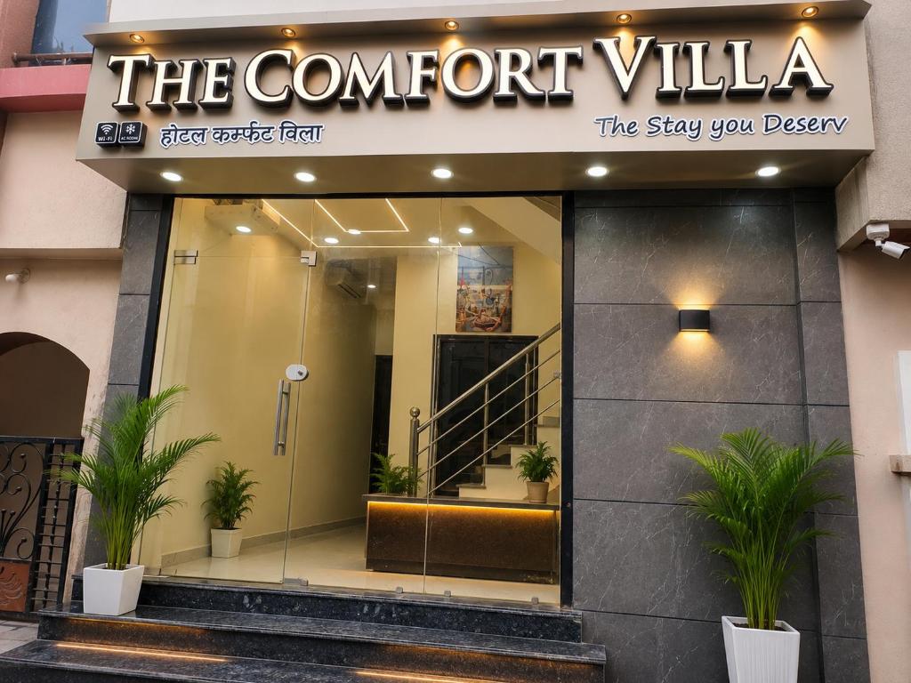a sign for the comfort villa the sign you deserve at The Comfort Villa in Ujjain