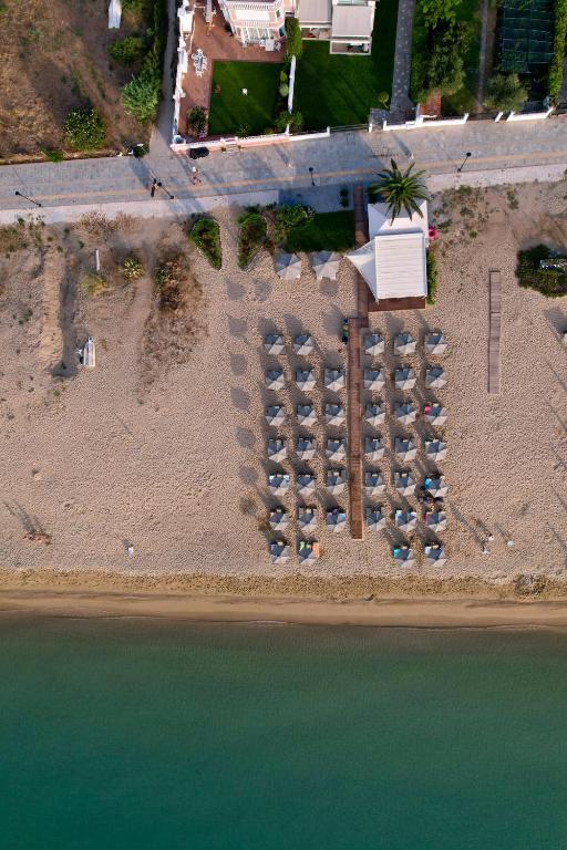 an aerial view of a beach with a bunch of parking meters at Villa Mediterrane Hotel in Iraklitsa