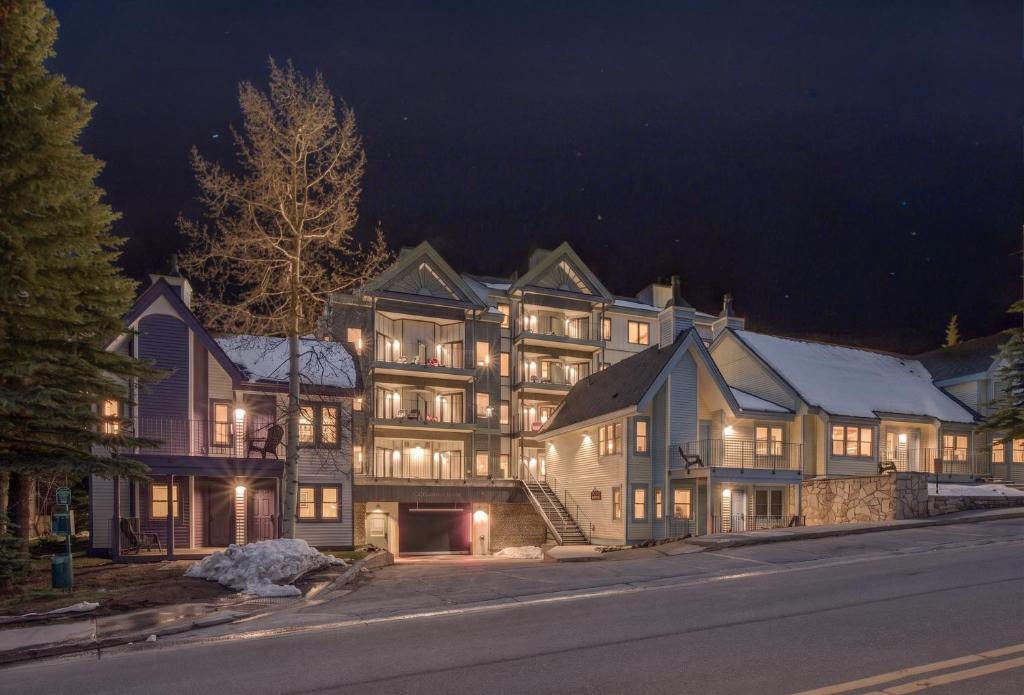 a large building on a street at night at Wedgewood Lodge in Breckenridge