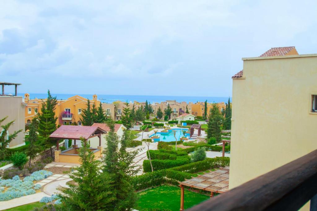 a view from the balcony of a resort at Chalet in Sahel Mountain view Diplo in Ras Elhekma