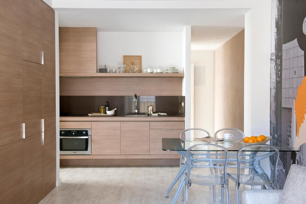 Kuchyň nebo kuchyňský kout v ubytování Eric Vökel Boutique Apartments - BCN Suites