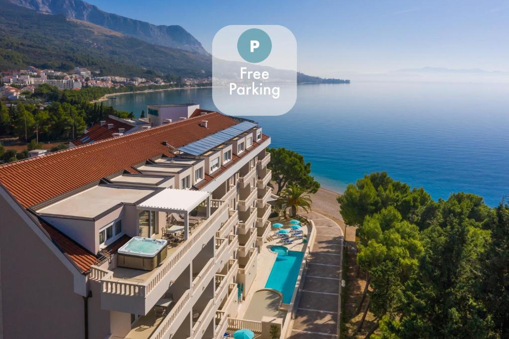 a rendering of a hotel with a view of the water at Hotel Tamaris in Tučepi