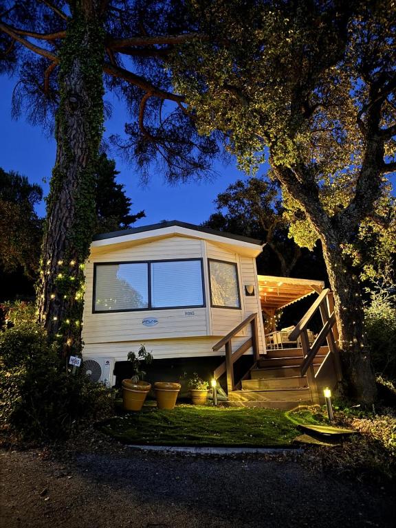 a tiny house sitting on the side of a driveway at St Tropez Surprise in Gassin