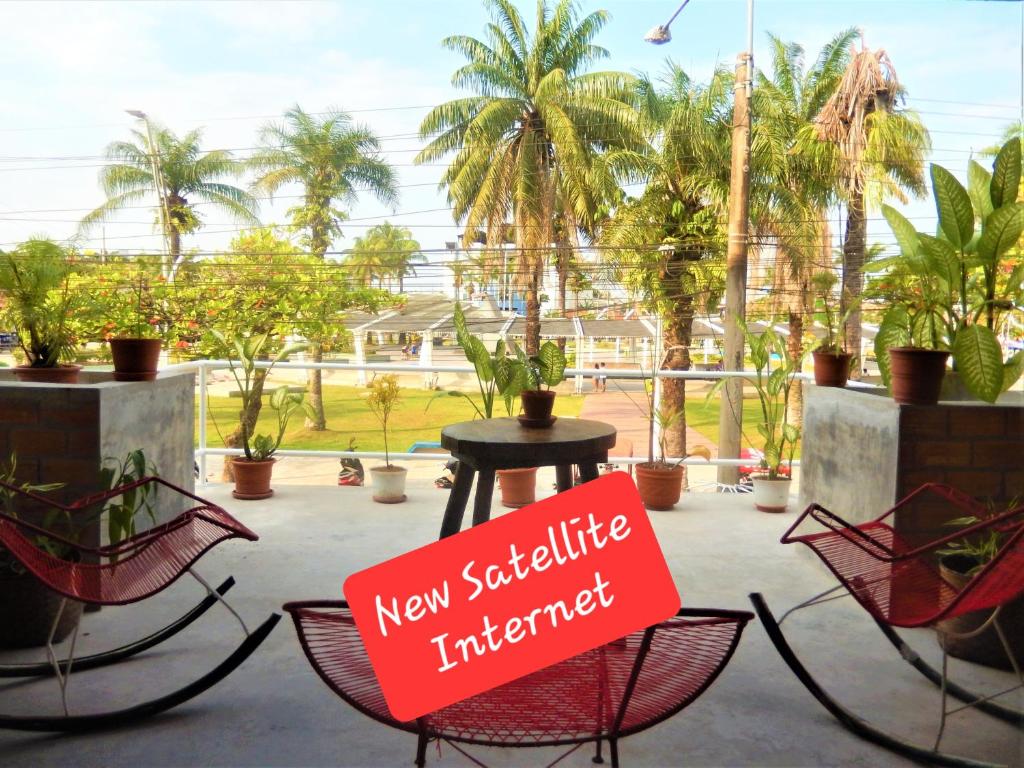 a sign that reads new self cultivate internet on a patio at Hospedaje Neydita in Iquitos