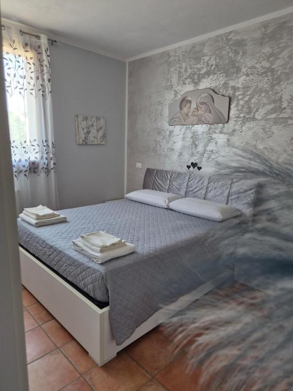 a bedroom with a large bed in a room at Castello Vignola in Vignola
