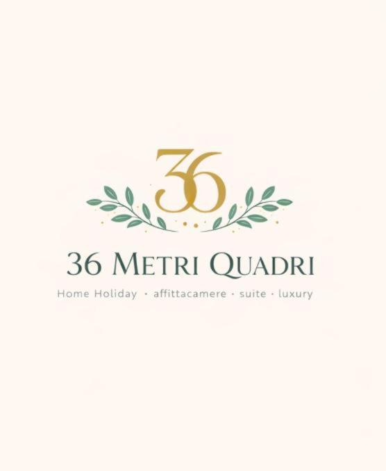 a anniversary logo with a laurelreath at 36 Metri quadri in Polignano a Mare