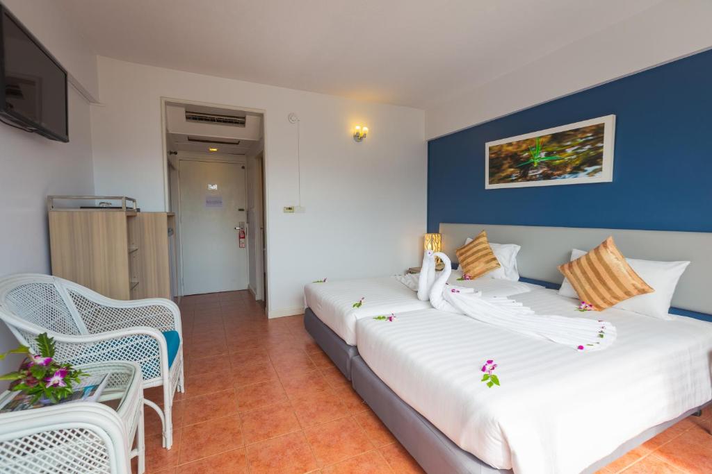 Postel nebo postele na pokoji v ubytování ON Hotel Phuket - SHA