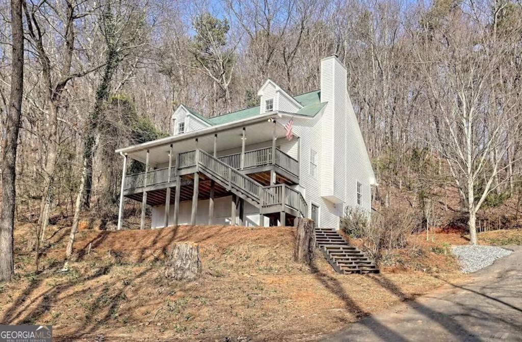 a large white house on top of a hill at Last house on the hill in Cleveland