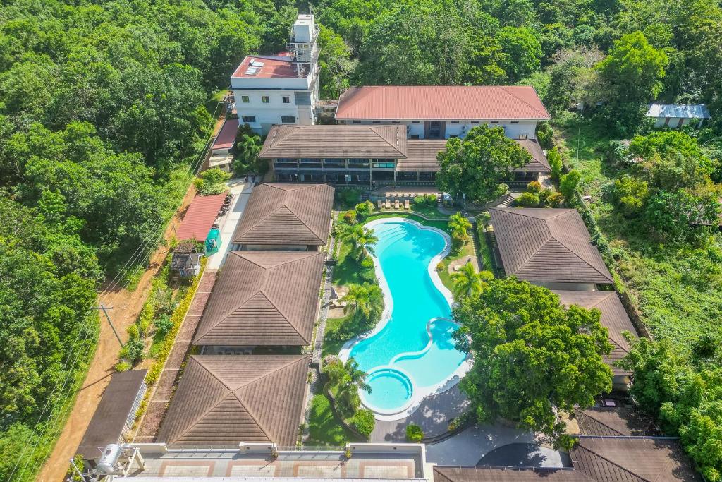 an aerial view of a resort with a pool at Coron Soleil Garden Resort in Coron