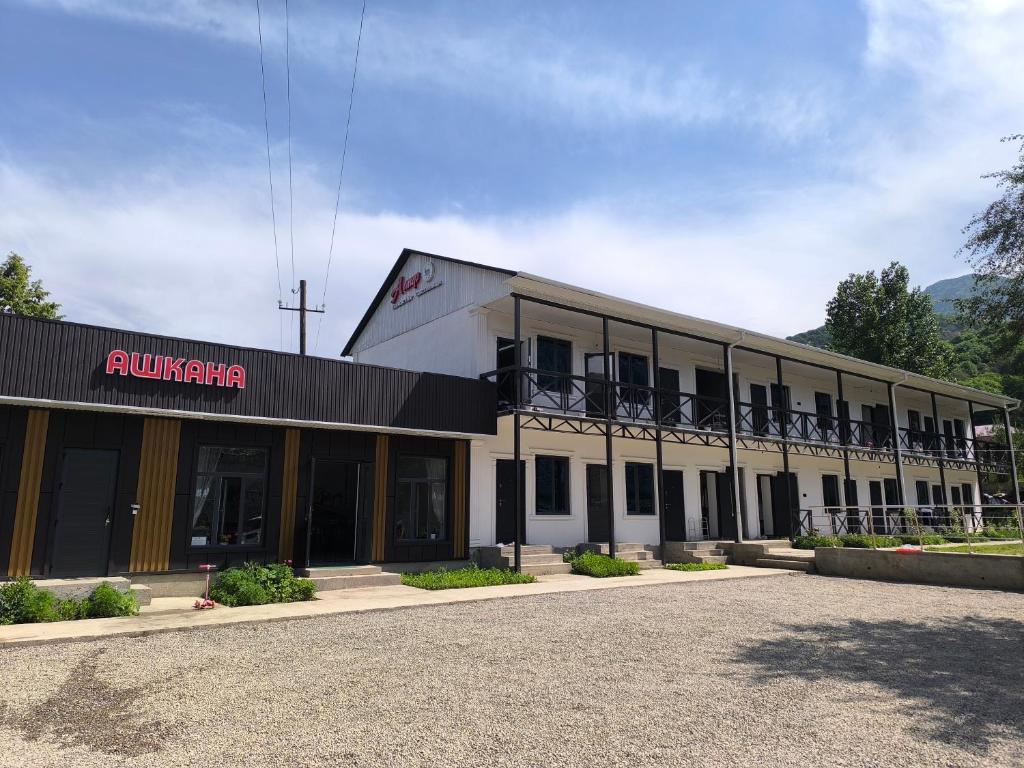 a large building with a building with a balcony at Амир in Arkit