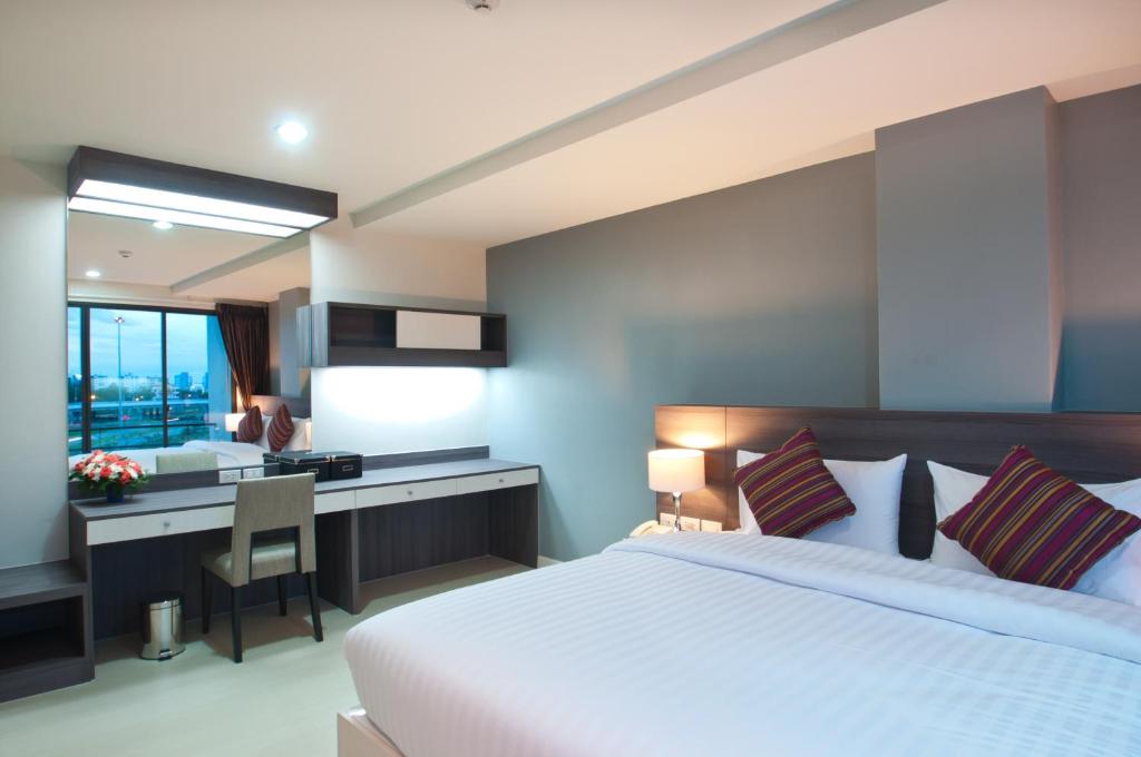 Postel nebo postele na pokoji v ubytování VC Residence - Chon Buri