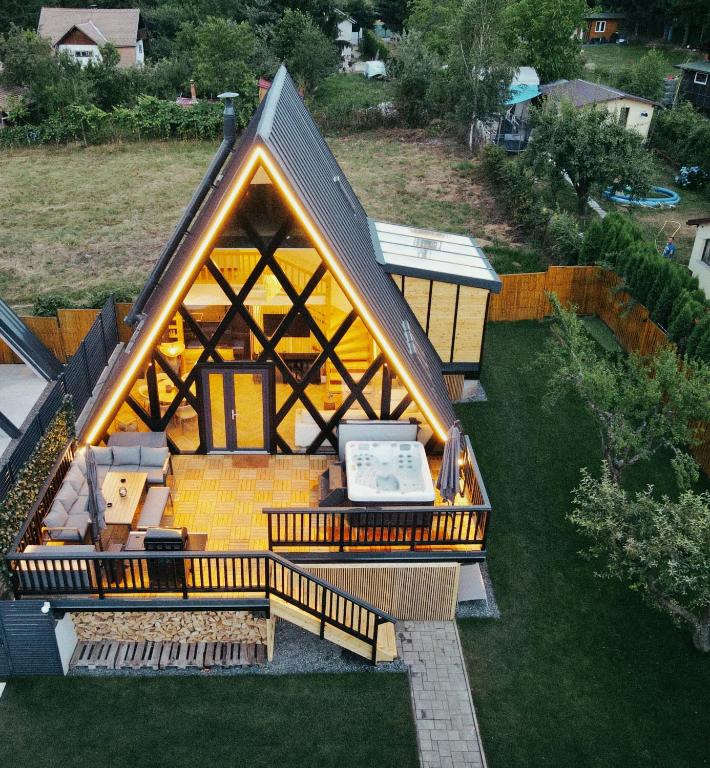 an overhead view of a house with a roof at Noora Nook in Sadu