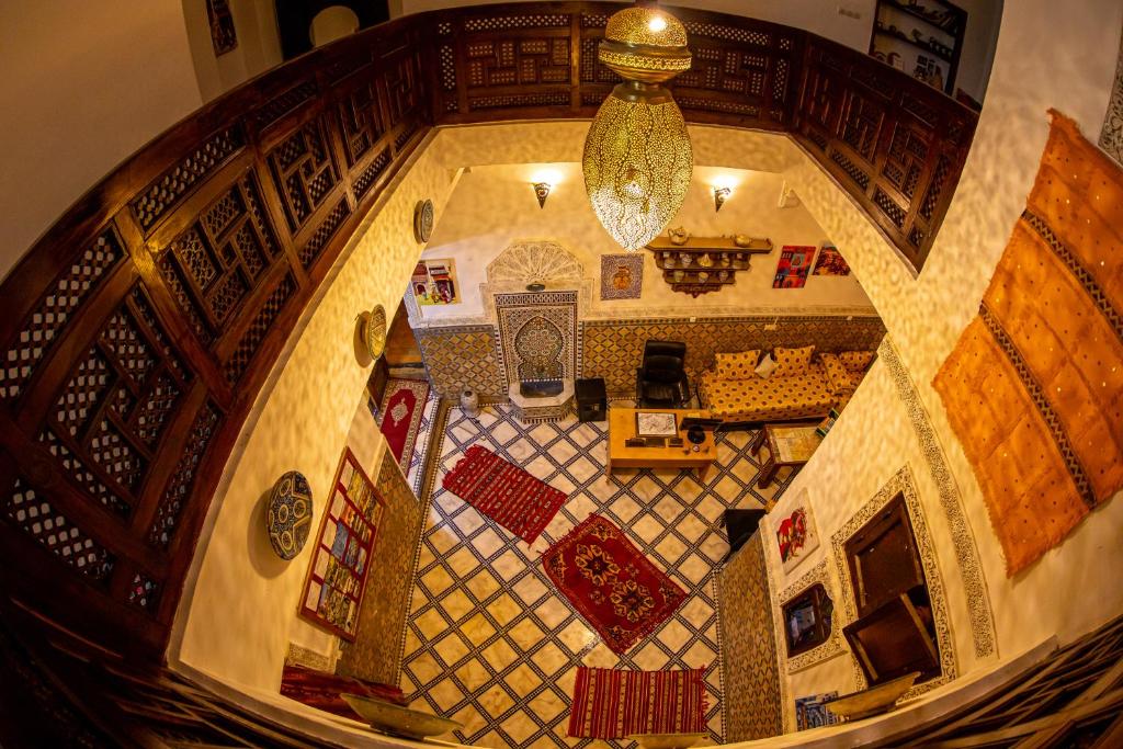 an overhead view of a room with a tile floor at Dar Amireal Fez in Fez