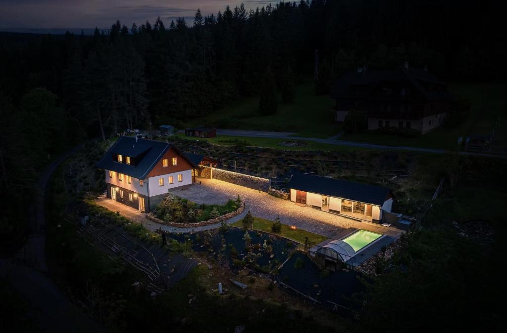 an aerial view of a house at night at Apartmány - Chata Zadov in Prachatice