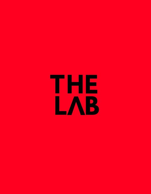 a red background with the lab text on it at ThE LAB in Casale Marittimo