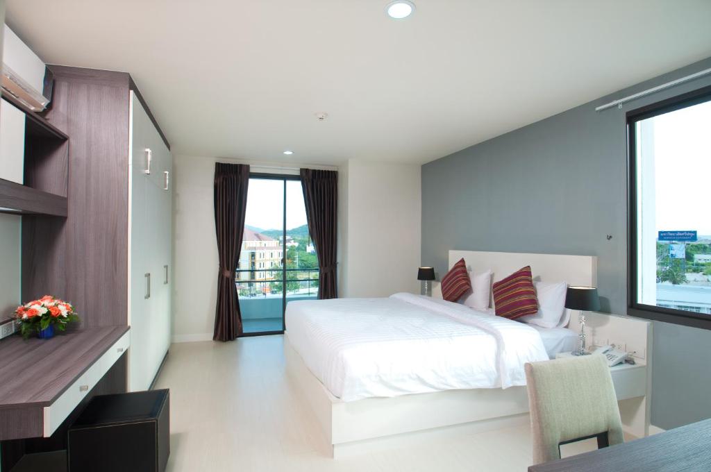 Postel nebo postele na pokoji v ubytování VC Residence - Chon Buri