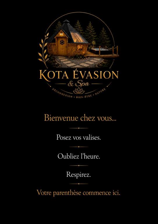 a sign that says kota expansion and spa with a house at Kota Évasion & Spa in Cahors