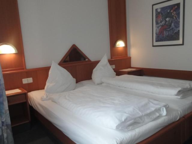 Postel nebo postele na pokoji v ubytování Landgasthof Hotel Bechtel