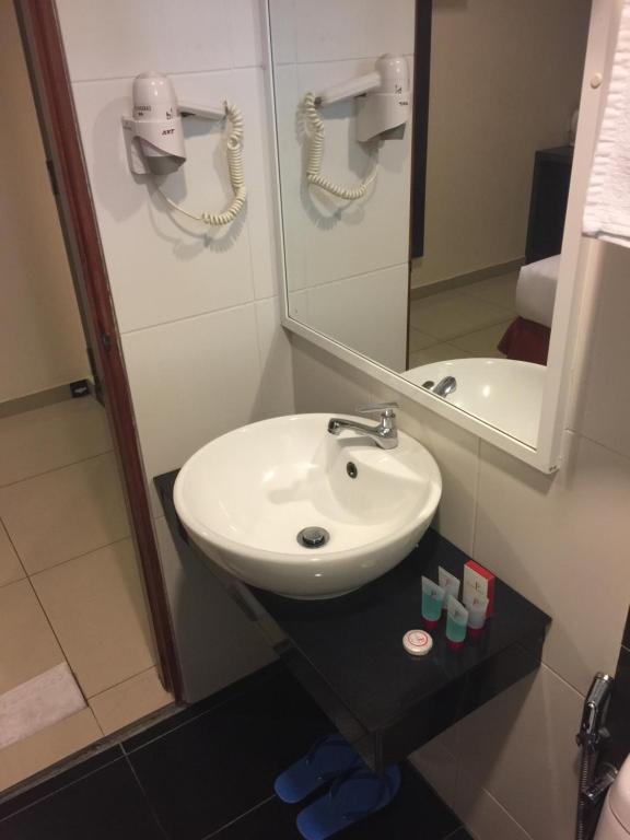 Koupelna v ubytování Premierz Hotel