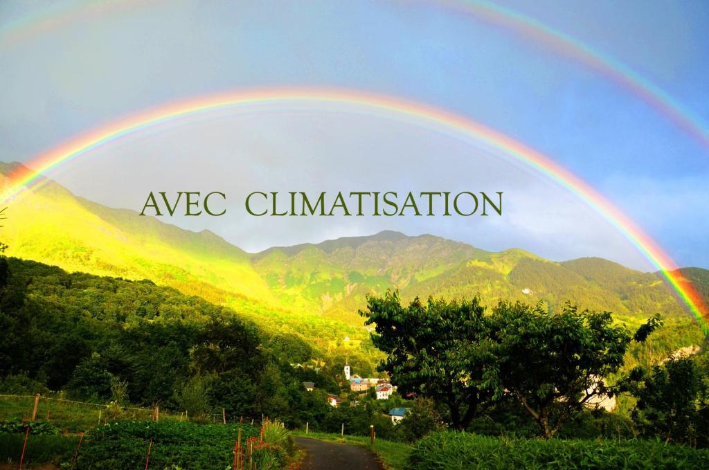 a rainbow with the words agec quantification written at Petit chalet Chez Gaston in Saint-François-Longchamp