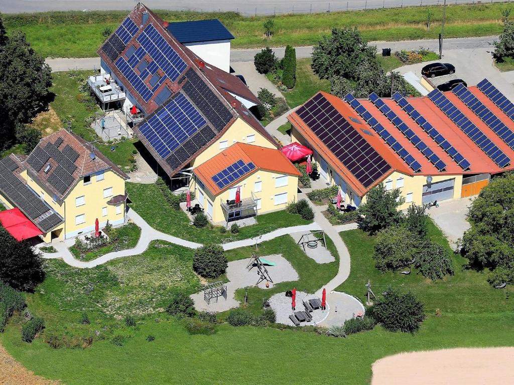 a model of a house with solar panels on it at Ferienhof Häckler in Ochsenhausen