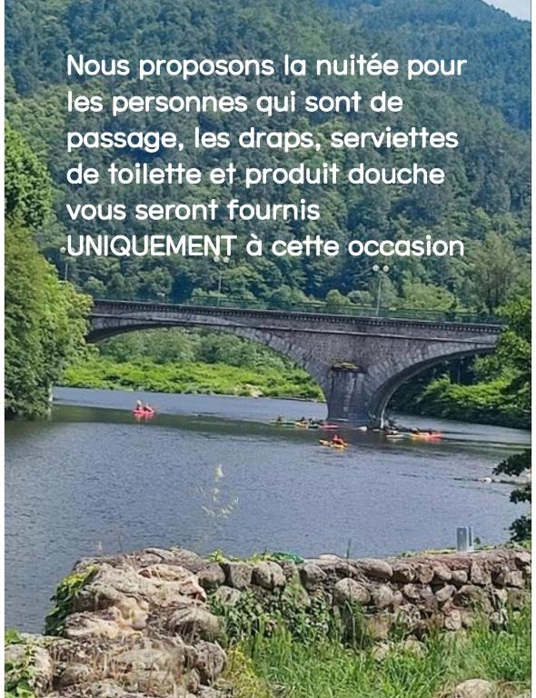a picture of a bridge over a river with a quote at Gîte Lydmalida cocon Ardéchois in Les Ollières-sur-Eyrieux