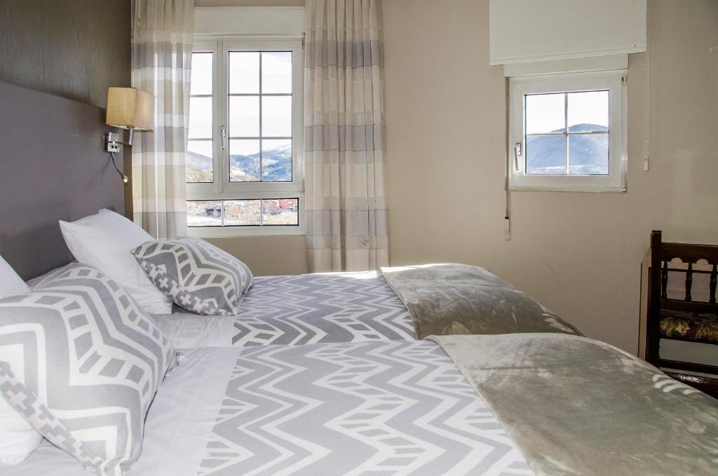 Cama o camas de una habitación en Hotel Presa