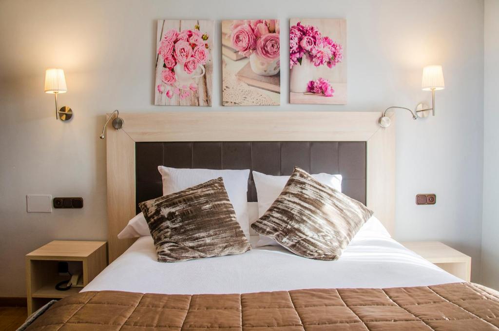 Cama o camas de una habitación en Hotel Presa