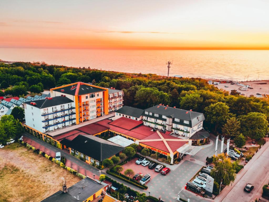 an overhead view of a building with a parking lot at Hotel Lidia - część Economy in Darłowo