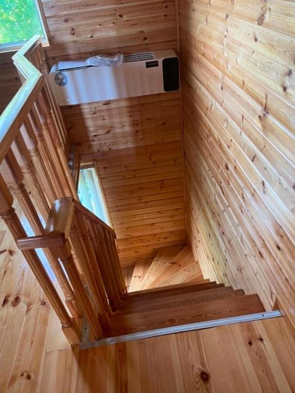 an inside view of a sauna with a toilet at Cottage Sandro-Sandro in Kinkisha