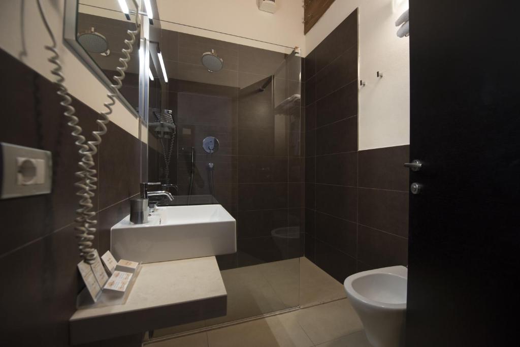 Koupelna v ubytování Hotel Iride & Spa