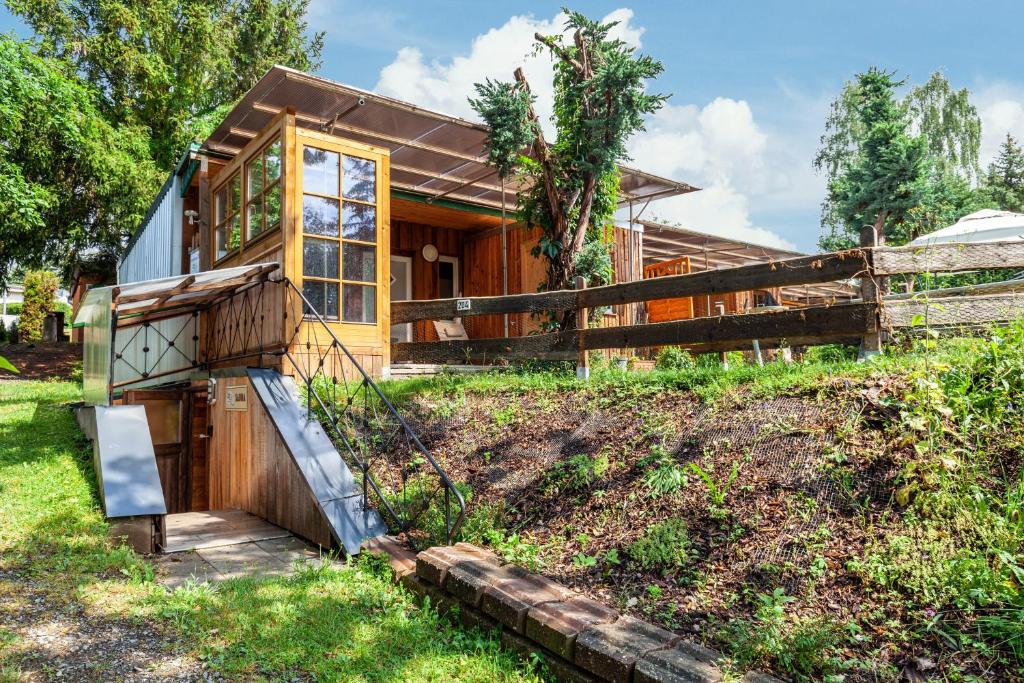 a house on a hill with a fence at Ferienhaus 204 in Zadelsdorf