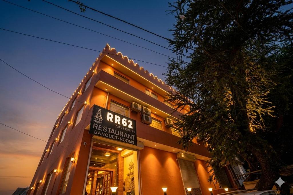a building with a sign on the side of it at Hotel RR 62-Jaipur City Centre Hotel in Jaipur